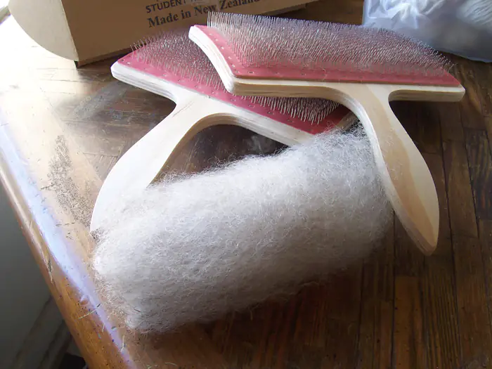 Hand carders with rolag Hand carders with rolag