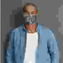 Man wearing Martex Health camouflage olive coloured reusable face mask with antimicrobial protection.