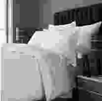 Plain white sateen duvet cover made from 100% cotton with a 300 thread count