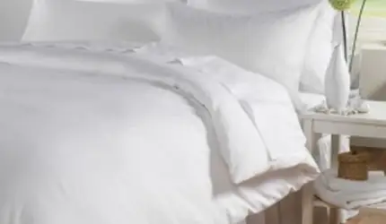 white cotton bedding